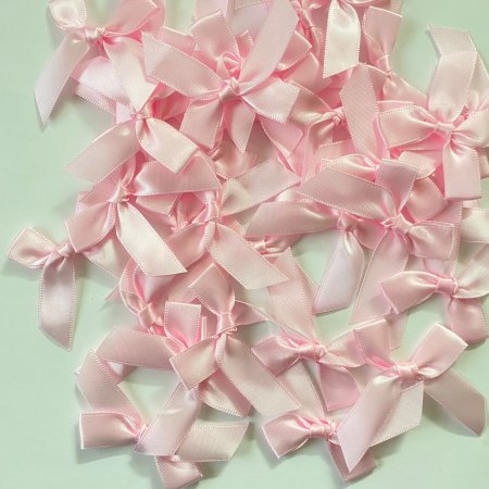 100ببيونة لون زهري مقاس1.5cm